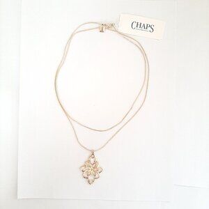 Chaps Long Gold Tone Pendant Necklace with Intricate Floral Geometric Design